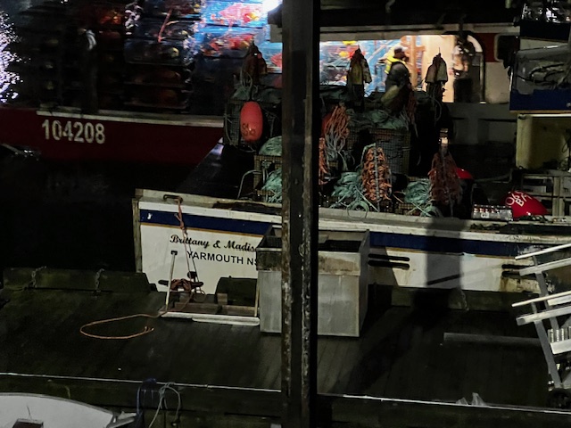 Close-up of fishing vessel Brittany and Madison from Yarmouth Nova Scotia with lobster traps and gear